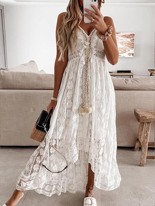 White boho lace dress with V-neck, sleeveless cut, tiered skirt and embroidered trim