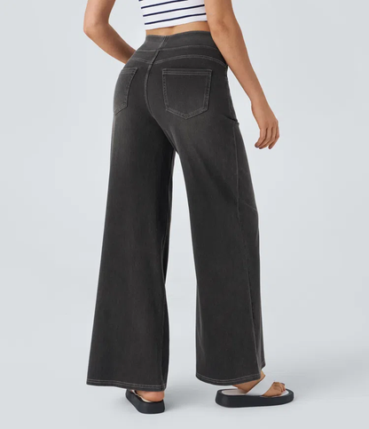 Relaxed wide-leg jeans in dark charcoal, back view with patch pocket and belt loops