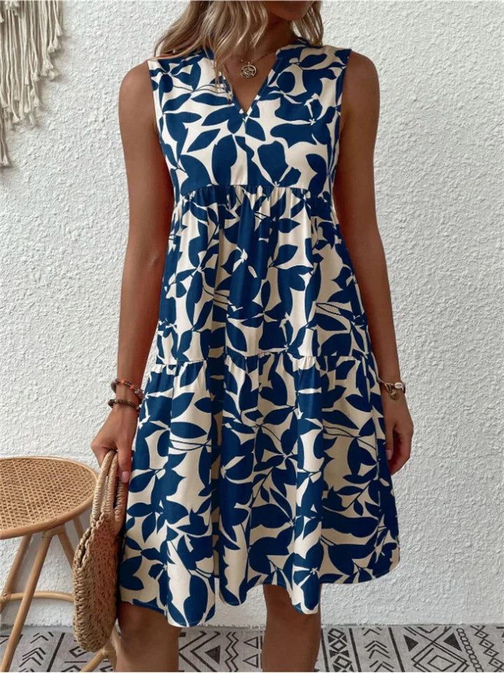 Blue leaf-print sleeveless V-neck flowy dress with gathered tiered skirt