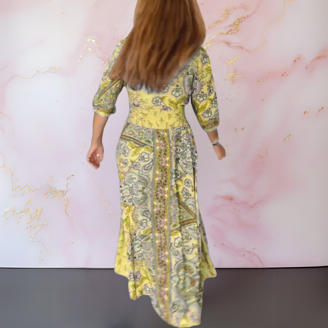 Yellow patterned long-sleeve summer dress, back view with vertical trim