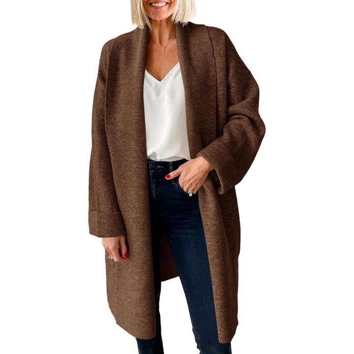 Brown oversized long open-front cardigan, chunky knit with relaxed drape.