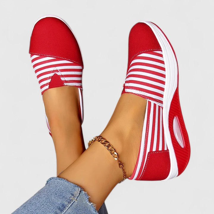 Anika orthopedic slip-on sneakers, red upper with white striped panels and cushioned white sole