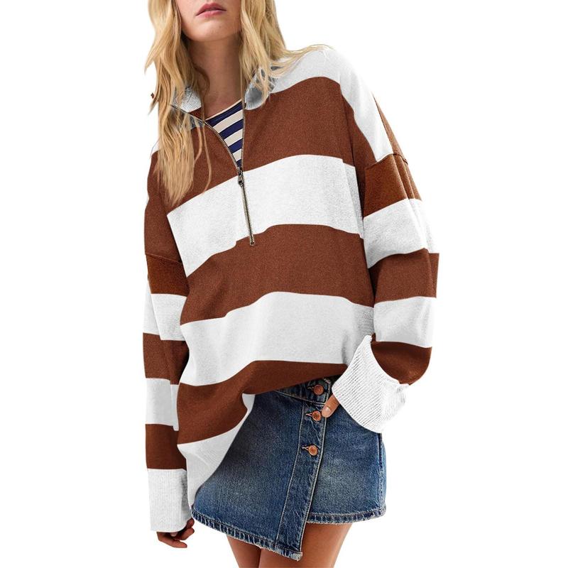 Oversized turtleneck sweater with brown-and-white striped half-zip