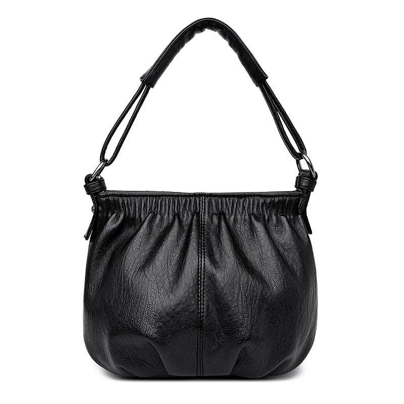 Black multi-layer handbag with gathered front, top handles, and central zipper pocket