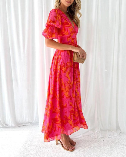 Red and pink puff-sleeve maxi dress with V-neck and gathered waist