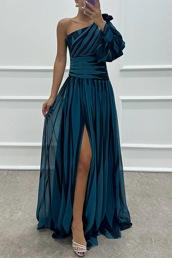 One-shoulder maxi dress in navy blue with darker striped pleats and side slit