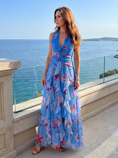 Blue floral maxi dress with halter neck, ruched waist and layered ruffle tiers