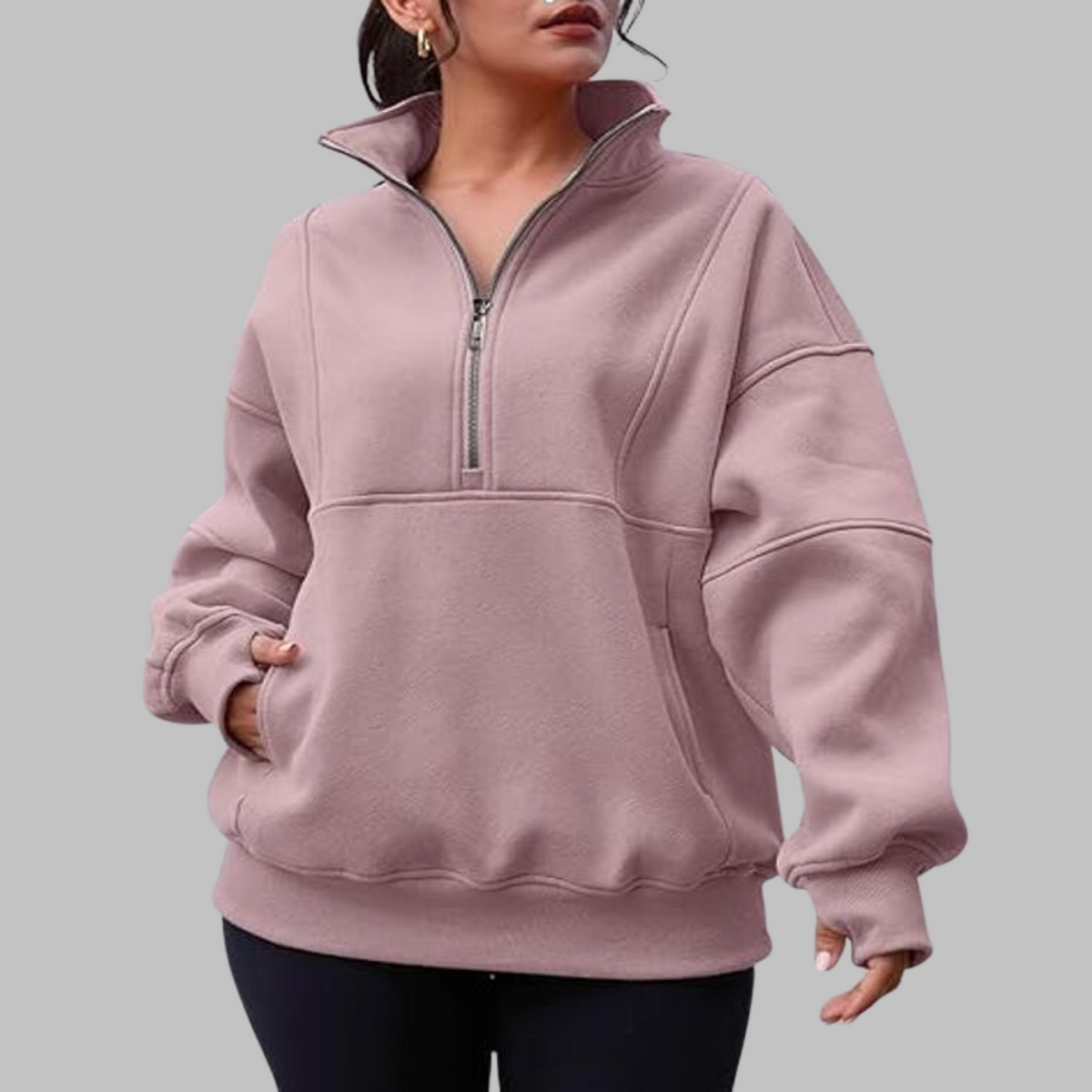 Dusty rose oversized half-zip long sleeve sweatshirt with ribbed cuffs, collar, and front pocket