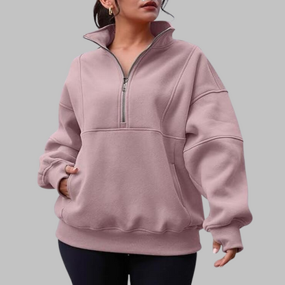 Dusty rose oversized half-zip long sleeve sweatshirt with ribbed cuffs, collar, and front pocket