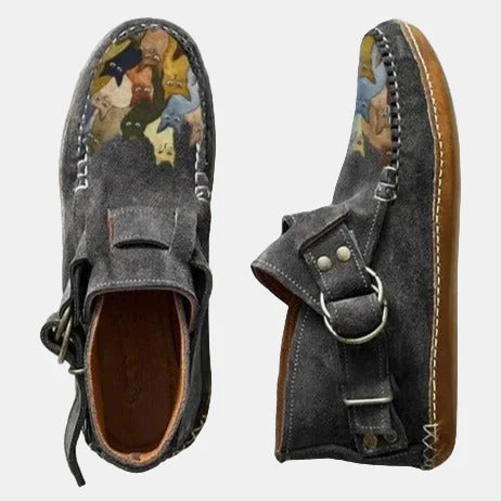 Printed ankle boots in dark grey suede with buckle strap and lace tie, animal print lining