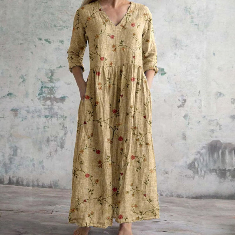 Beige floral long maxi dress with V-neck and 3/4 sleeves, tiered gathered skirt