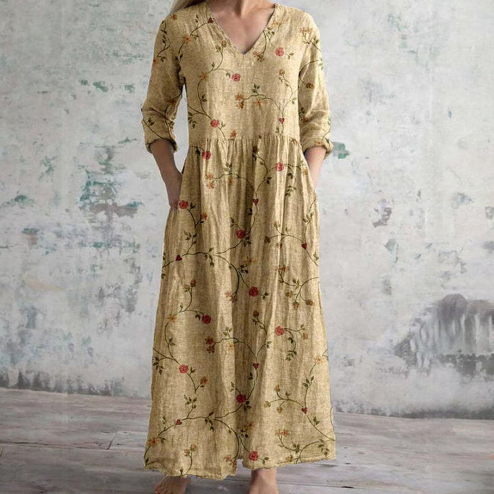 Beige floral long maxi dress with V-neck and 3/4 sleeves, tiered gathered skirt