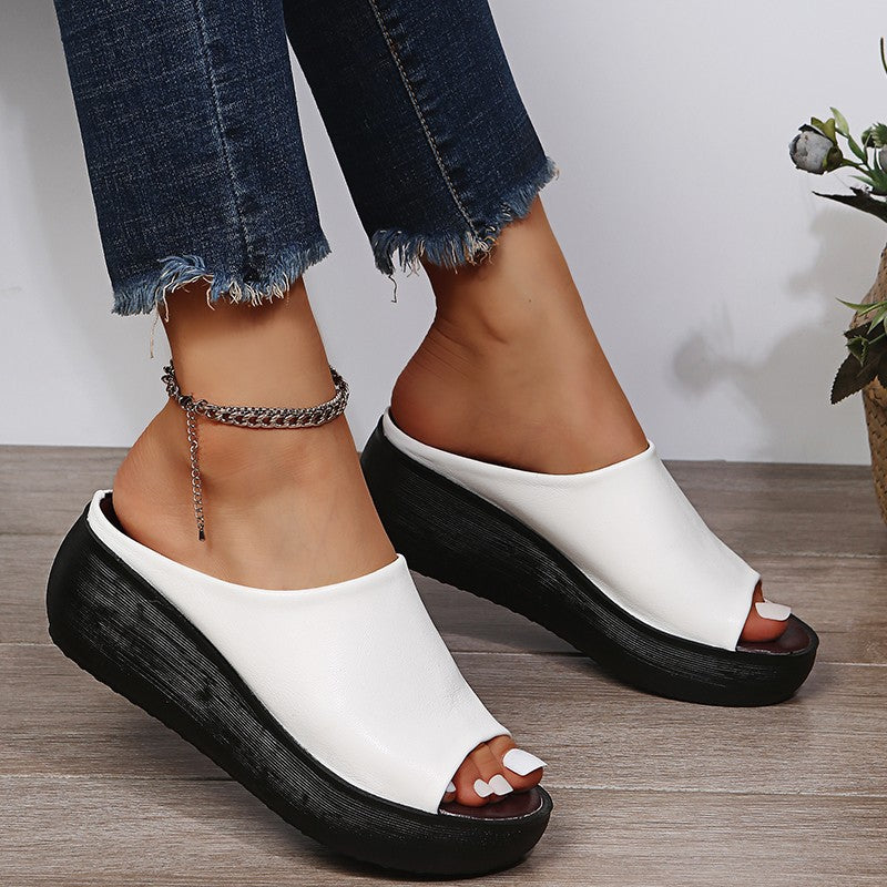 White orthopedic slide sandals with wide open toe and thick wedge platform sole