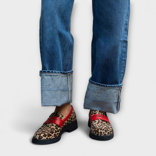 Leopard print round-toe loafers with red strap and dark sole
