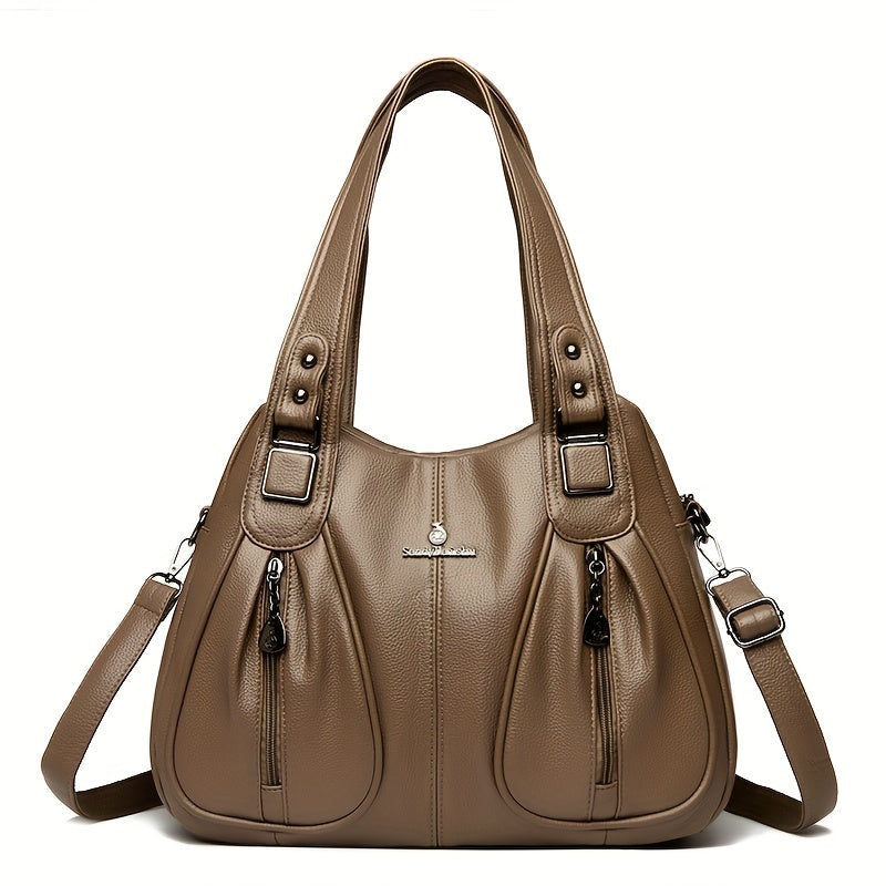 Women’s casual shoulder bag in khaki with top handles and adjustable shoulder strap.