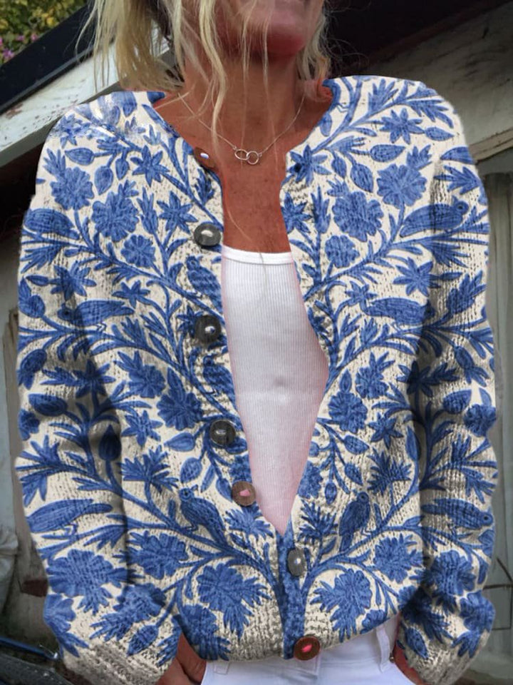 Blue vintage floral cardigan with V-neck and button front, long sleeves