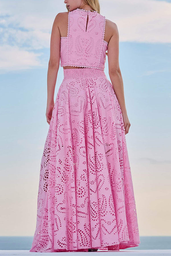 Two-piece set with pink sleeveless embroidered high-neck top and matching maxi skirt