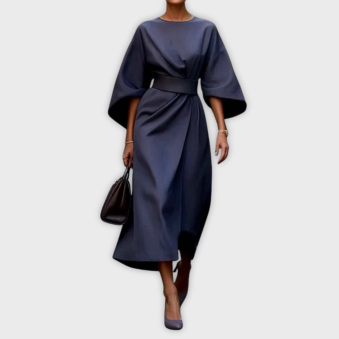 Navy belted dolman sleeve midi dress with waist knot detail.
