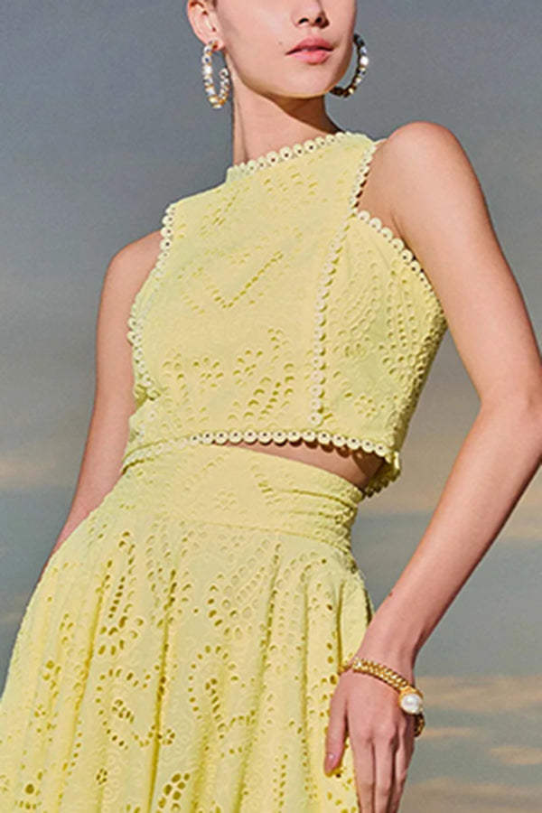 Yellow embroidered sleeveless crop top and high-waist maxi skirt set with scalloped trim