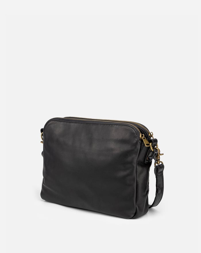 Jovie sleek three-layer crossbody bag in black with zip closure and wrist strap
