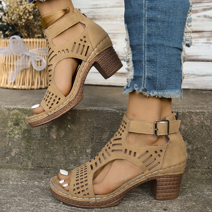 Light brown ergonomic sandals with perforated uppers, ankle buckle, and block heel