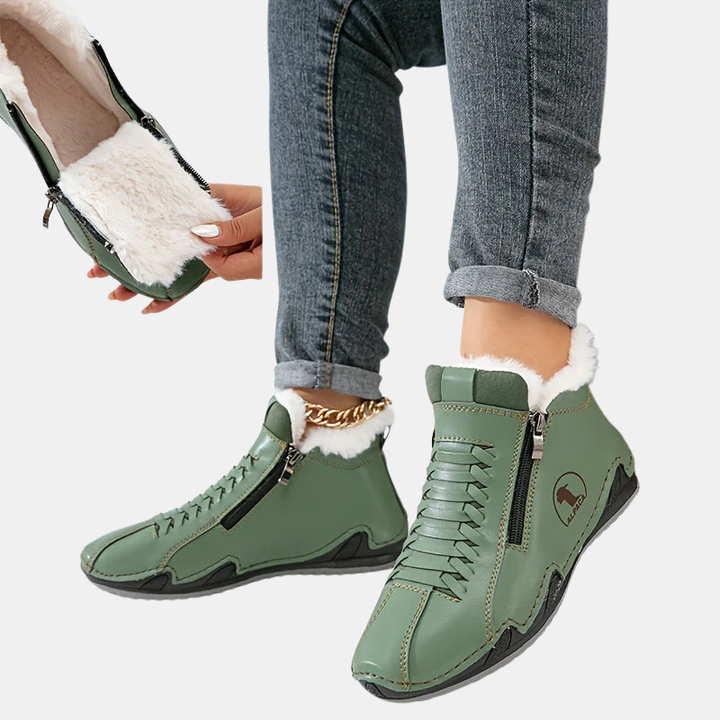 Green ergonomic boots with side zipper, lace-up details, and white faux-fur lining