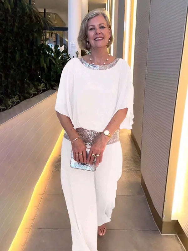 White relaxed top and wide-leg trousers set, sequined waistband
