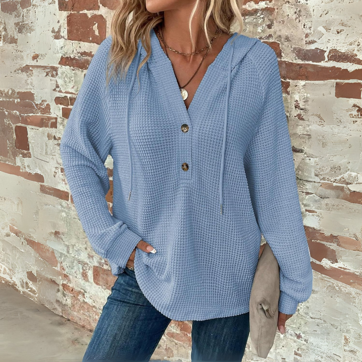 Light blue waffle-knit hoodie with V-neck and button placket, long sleeves