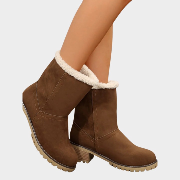Brown suede mid-heel winter boots with sherpa trim and chunky lug sole