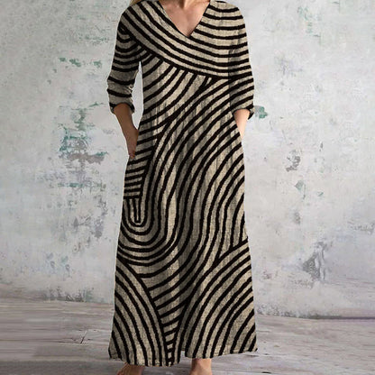 Effortless maxi dress with V-neck and long sleeves, black and cream striped pattern
