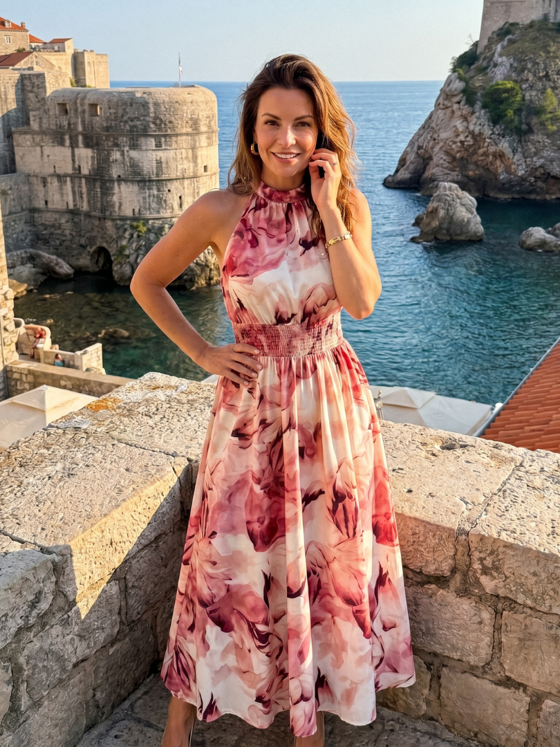 Pink and white abstract print halter midi dress with gathered waist