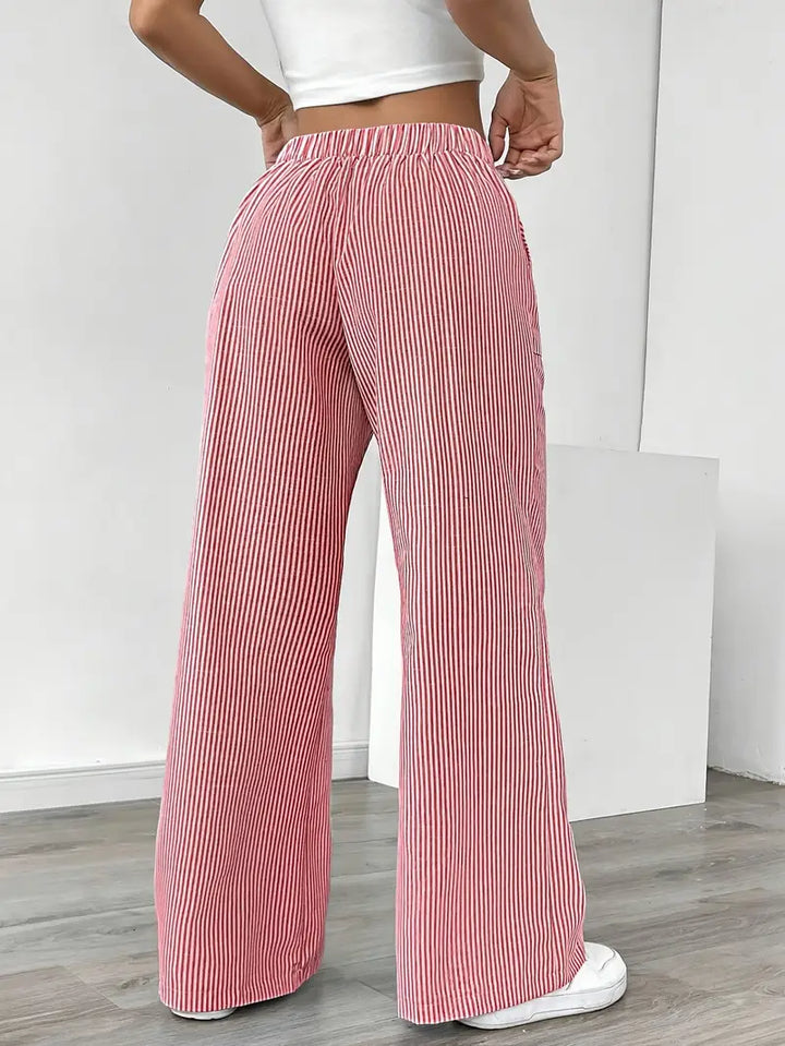 Pink striped wide-leg pants with elastic waistband and straight wide legs