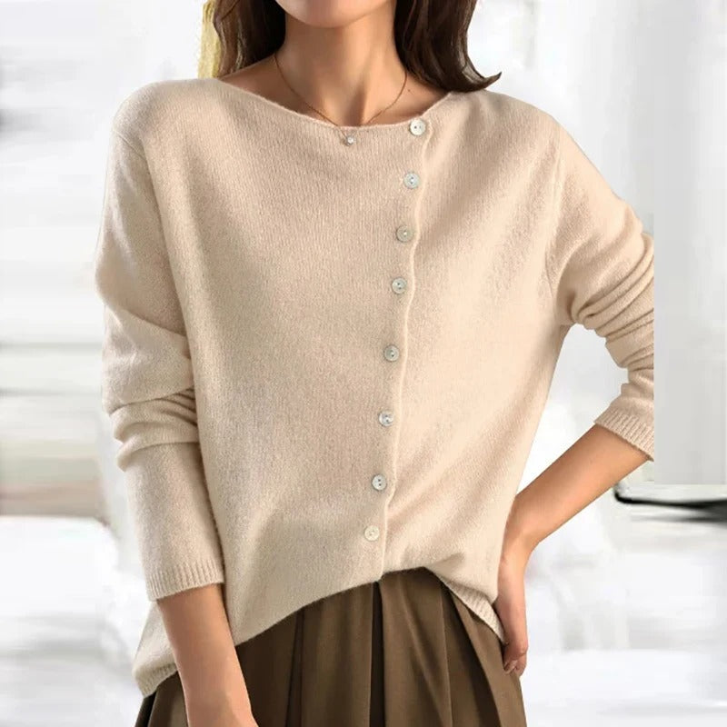 Beige buttoned V-neck sweater with long sleeves and ribbed neckline