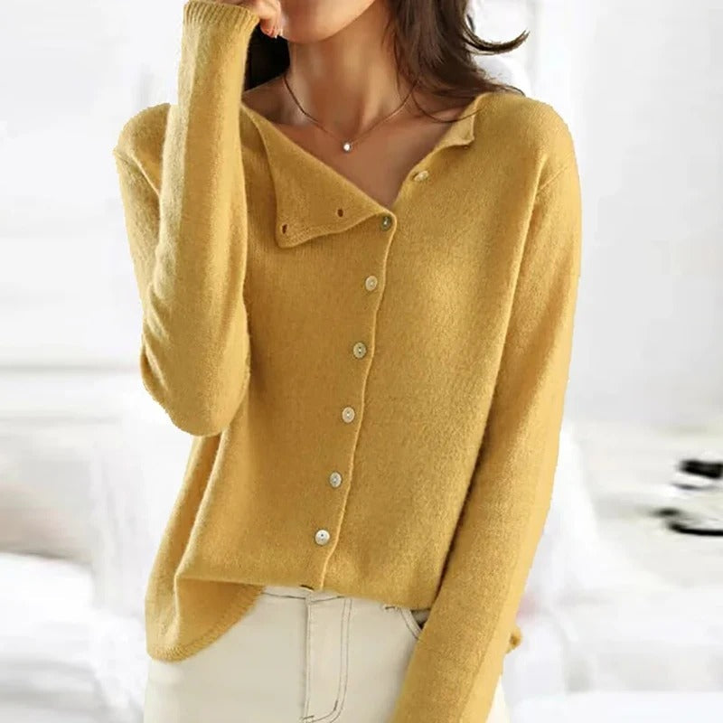 Mustard yellow buttoned V-neck sweater with long sleeves and round buttons