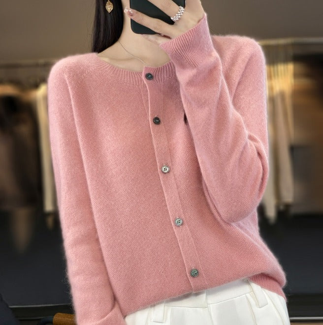 Pink soft button-up cardigan sweater with front button placket and long sleeves