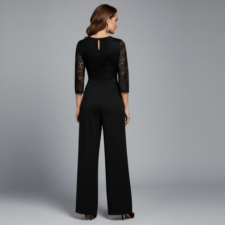 Black lace evening jumpsuit, back view with keyhole at neckline and wide-leg pants