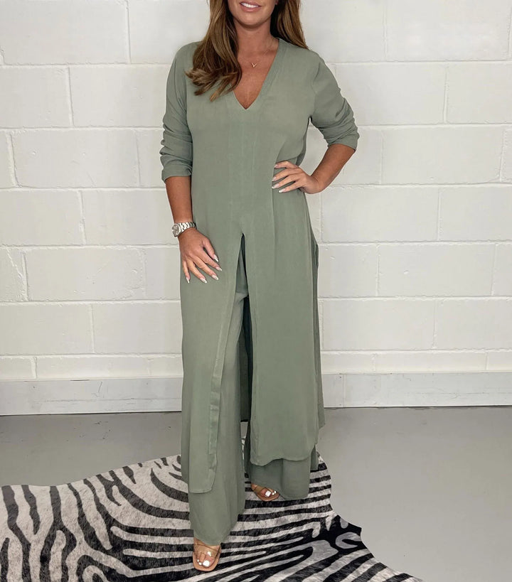 Olive green two-piece set with V-neck flowy blouse and wide-leg trousers, side slits