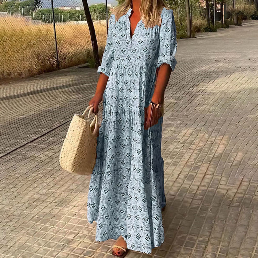 Boho maxi dress, sage green with allover leaf print, V-neck and tiered hem