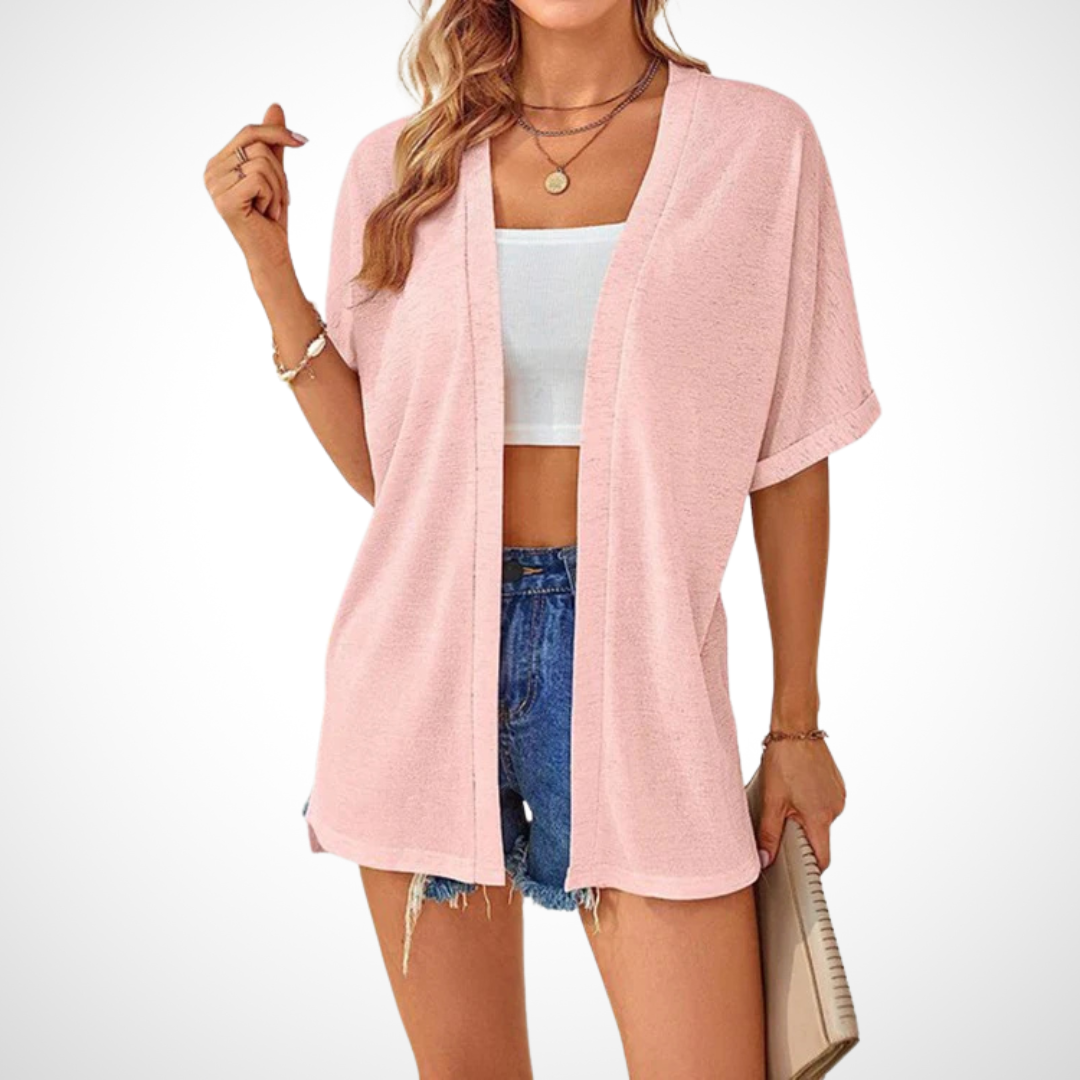 Flowy short-sleeve cardigan in pink with open front and relaxed draped fit