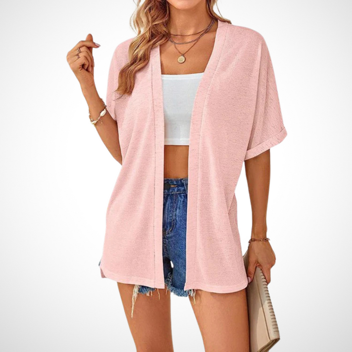 Flowy short-sleeve cardigan in pink with open front and relaxed draped fit