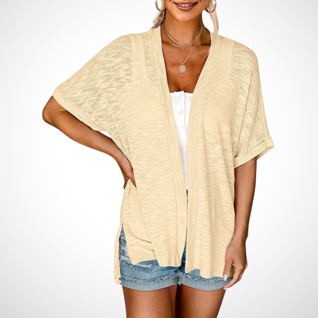 Flowy short-sleeve cardigan in light apricot with open front and draped hem