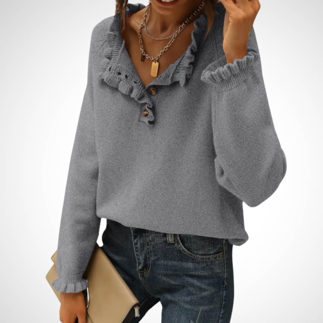 Gray long-sleeve pullover sweater with half-button placket and ruffled collar.