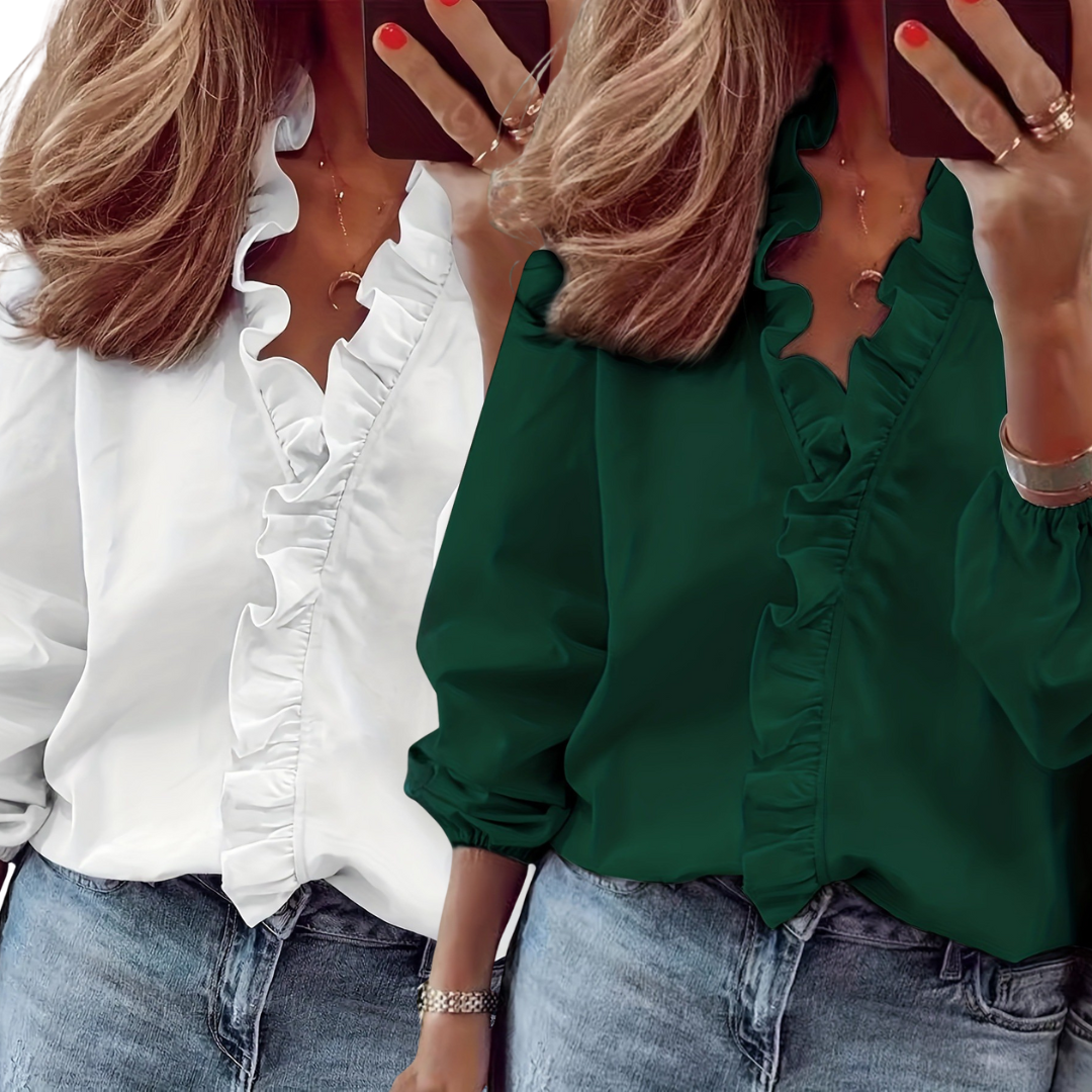 Two ruffle V-neck blouses, one white and one dark green; long sleeves, gathered cuffs