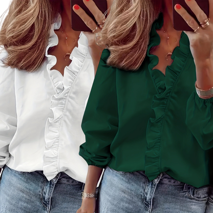 Two ruffle V-neck blouses, one white and one dark green; long sleeves, gathered cuffs