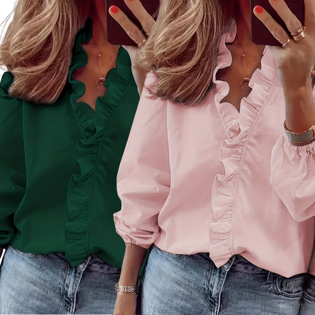 Two ruffle V-neck blouses, dark green and pale pink; long sleeves with gathered cuffs