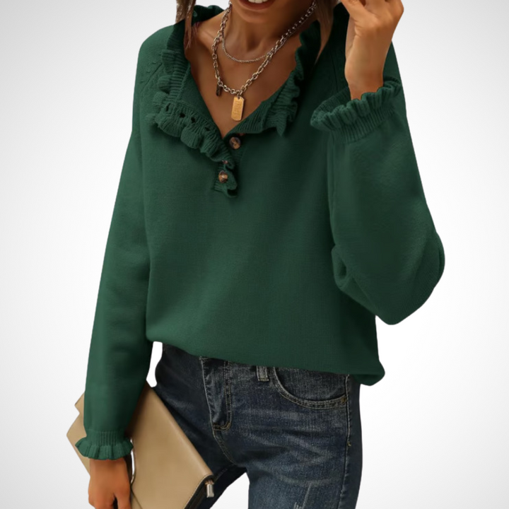 Green long-sleeve pullover sweater with half-button placket and ruffled collar.