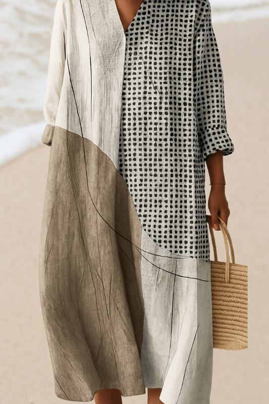 Patchwork dress with black grid dots on white, long sleeves and balloon hem
