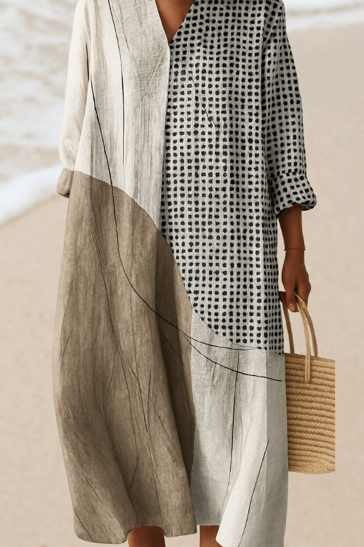 Patchwork dress with black grid dots on white, long sleeves and balloon hem