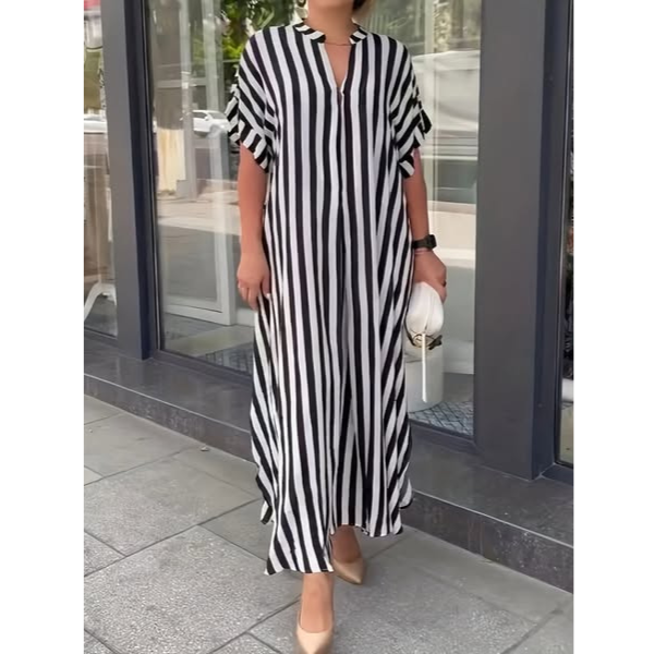 Black-and-white striped maxi dress with V-neck and short flutter sleeves, front slit