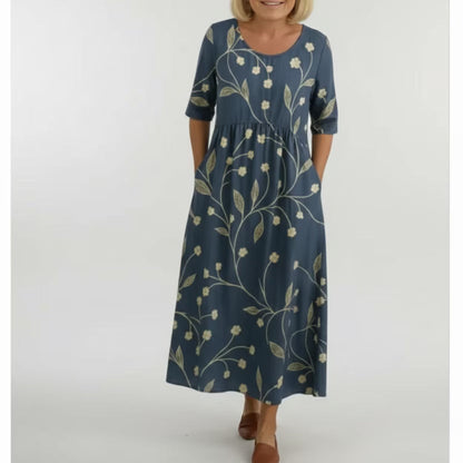 Relaxed navy maxi dress with yellow floral print, short sleeves and round neckline